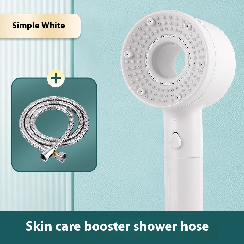 White skin care booster shower head with hose.